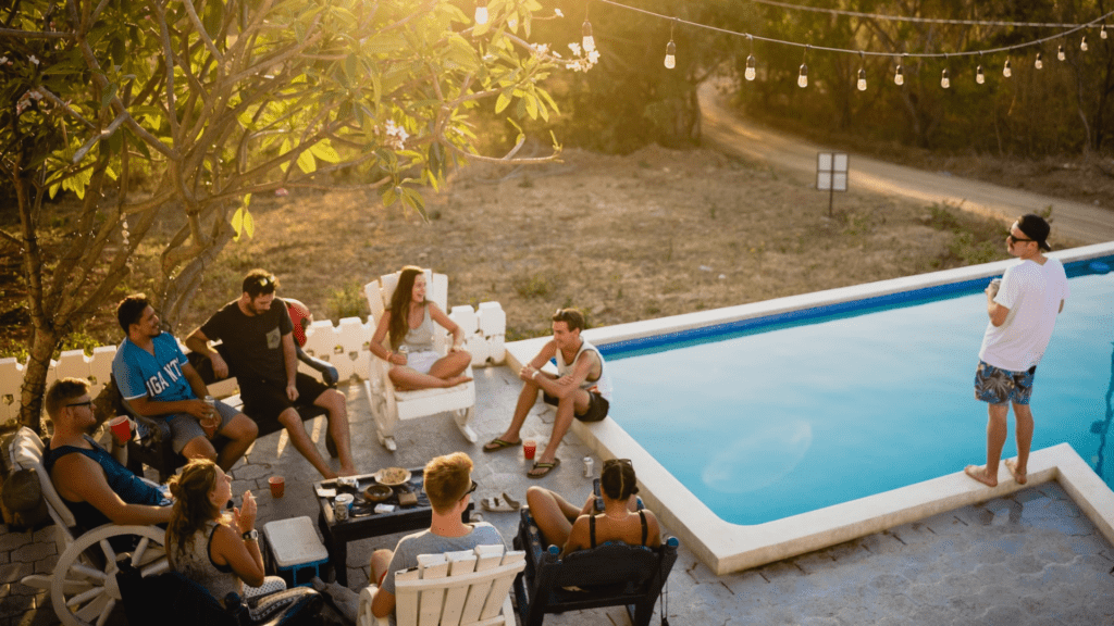 group of friends hangout poolside